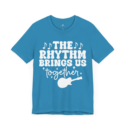 The Rhythm Brings Us Together Graphic Cotton T-Shirt - Trendy Short Sleeve Tee for Music Lovers and Community Vibes | Unique Design, Comfortable Fit, Premium Quality Printify