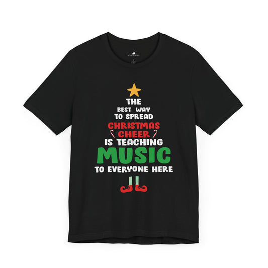 Christmas Cheer is Teaching Music Graphic Cotton T-Shirt - Festive Short Sleeve Tee for Music Teachers | Unique Design, Comfortable Fit, Premium Quality Printify