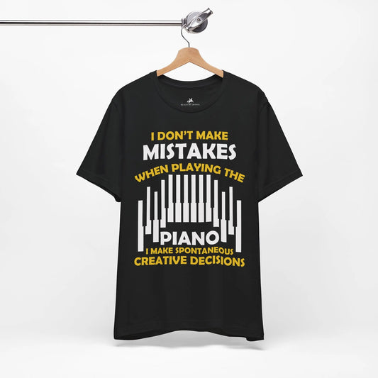 "I Don’t Make Mistakes When Playing the Piano, I Make Spontaneous Creative Decisions" Graphic T-Shirt – Embrace the Art of Improvisation! 🎹✨ Printify