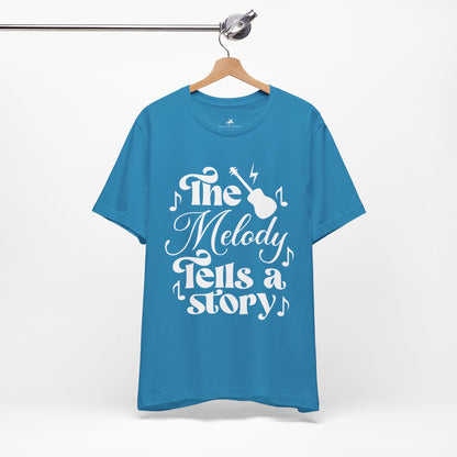 The Melody Tells a Story Graphic Cotton T-Shirt - Trendy Short Sleeve Tee for Music Enthusiasts and Storytellers | Unique Design, Comfortable Fit, Premium Quality Printify