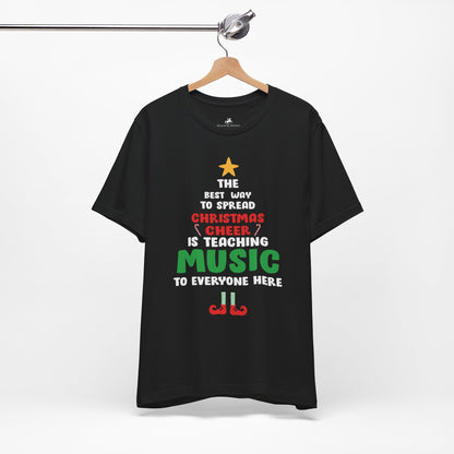 Christmas Cheer is Teaching Music Graphic Cotton T-Shirt - Festive Short Sleeve Tee for Music Teachers | Unique Design, Comfortable Fit, Premium Quality Printify