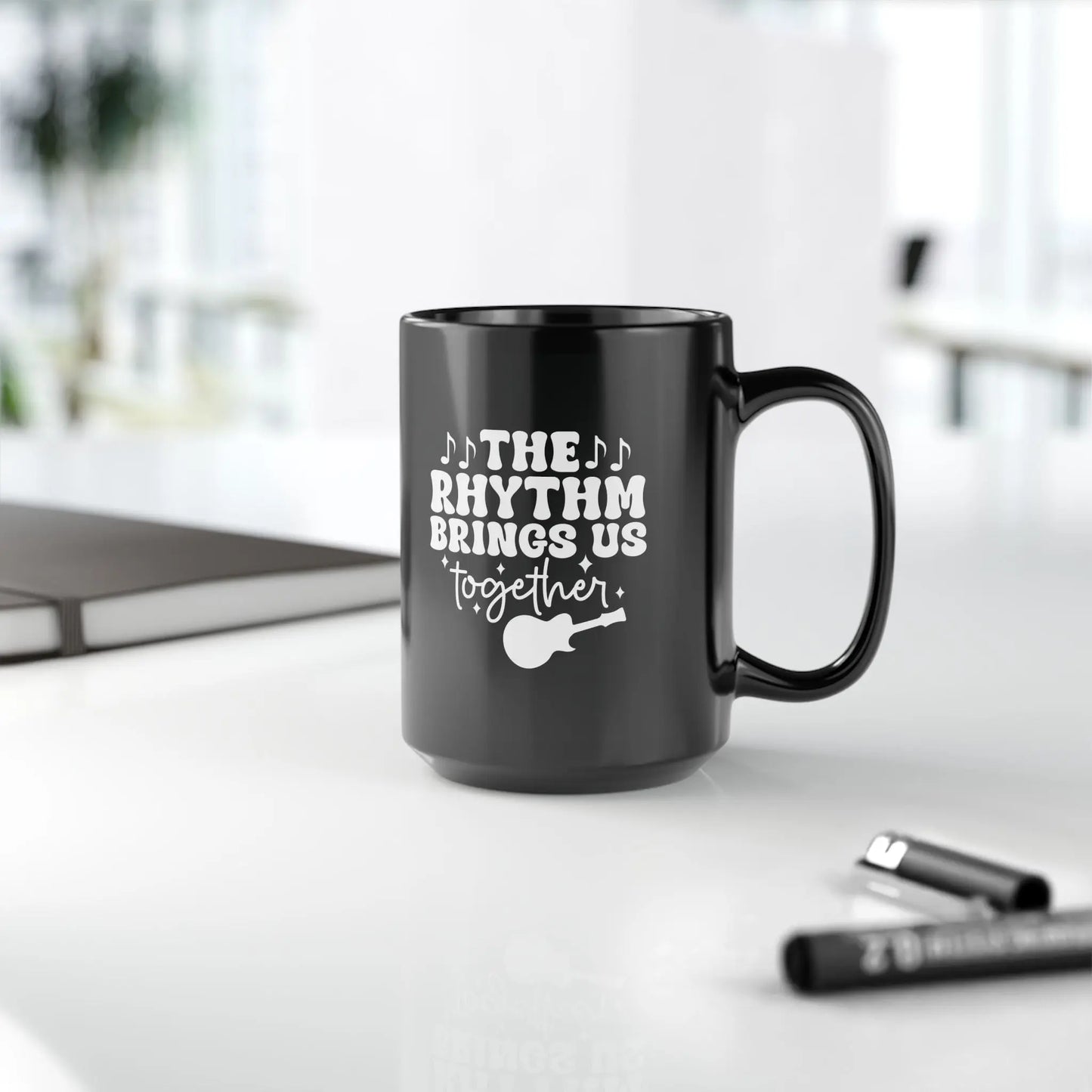 "The Rhythm Brings Us Together" Black Ceramic Mug – Perfect for Coffee, Tea & Hot Chocolate Lovers Printify