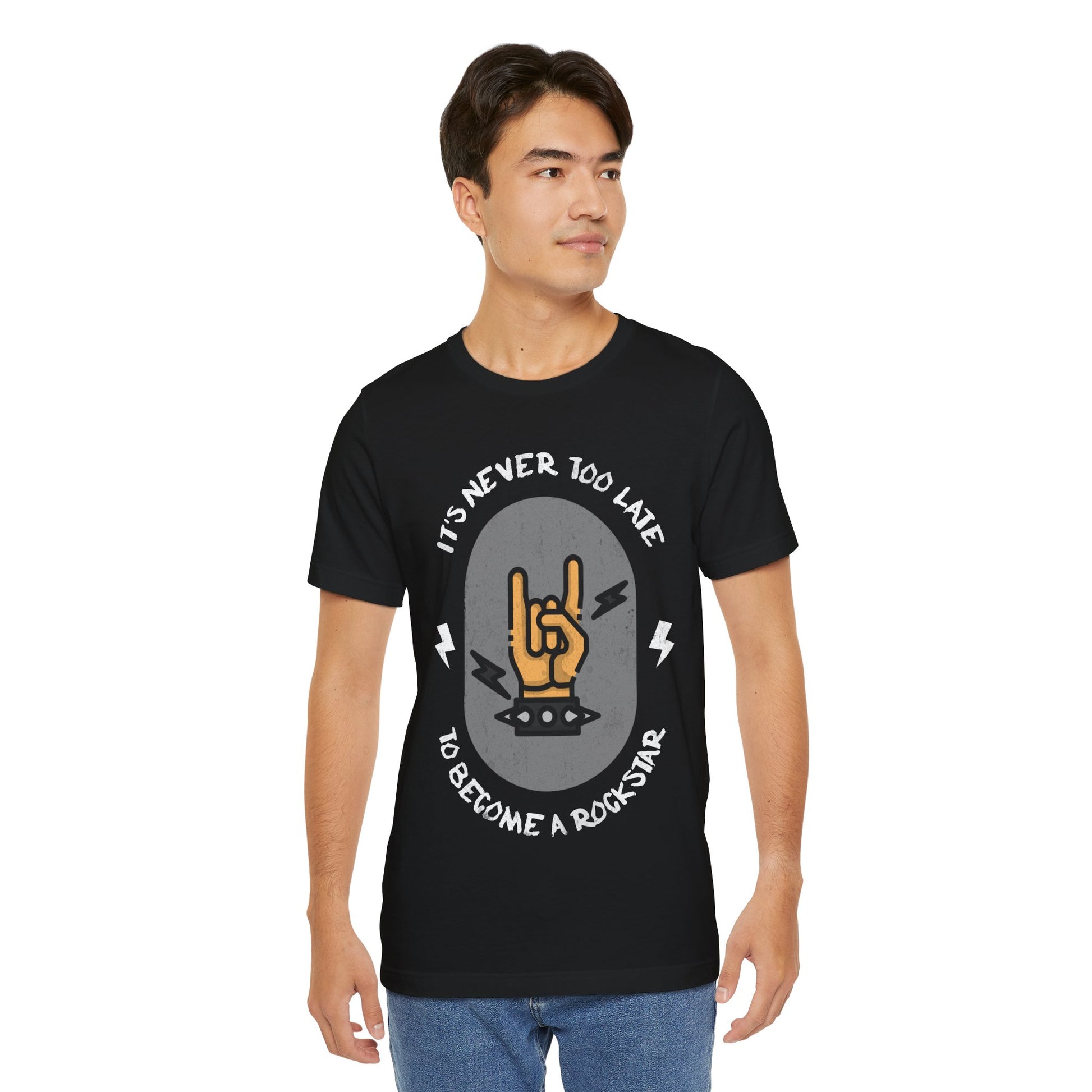 It's Never Too Late to Become a Rockstar Graphic Cotton T-Shirt - Motivational Short Sleeve Tee for Aspiring Musicians | Unique Design, Comfortable Fit, Premium Quality Printify